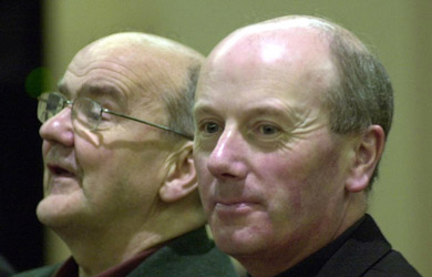 Michel  Seighin and Fr Michael Nallen at the hearing