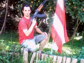 the Romanian folk singer with his gun & funderland flag