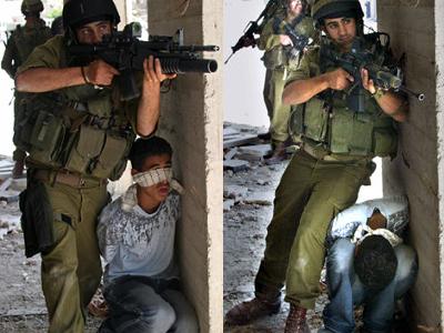 Israeli soldier uses Palestinian boy as Human Shield.