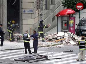 the clean-up after Fascist bomb attack in Galicia 23/7/05