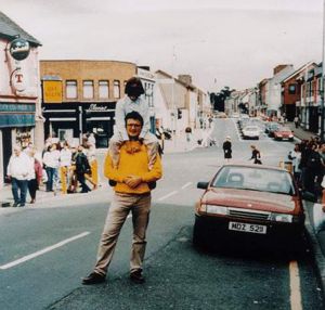 The red Vauxhall Cavalier carrying the bomb. This photo was taken by a tourist shortly before the explosion, the camera being found in the rubble afterwards.