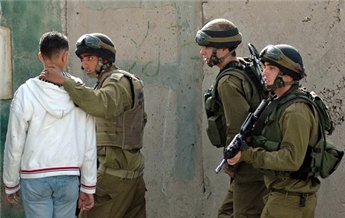 Israeli operatives (in green/olive uniforms) pictured in the act of kidnapping Palestinian child, they usually then demand a ransom for the safe return of the child