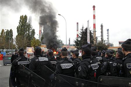 French riot police have forcibly cleared access to the main refinery supplying fuel to Paris