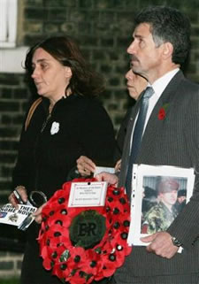 Rose Gentle and Reg Keys -carry a wreath and petition to hand in to British Prime Minister Tony Blair at 10 Downing Street in London Wednesday Nov. 10, 2004.