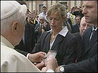 The Mc Cann Parents with the Pope as he blessed a photo of "Maddy".