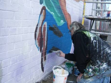 Mural being painted by renowned artist Danny Devenney