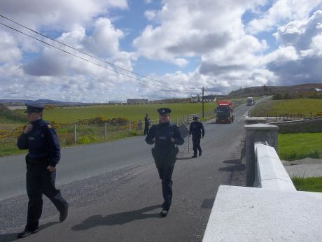 Along this once-quiet road, you can't sit waiting for your lift without being harassed by garda  