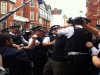 Police Assault Assange Supporters.