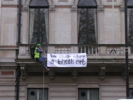 You should be ashamed says the banner in Gaelic 