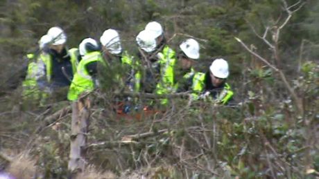 IRMS supervisor getting stretchered out of the woods.  Despite all of Shell's glossy brochures about worker safety, in reality they are totally reckless