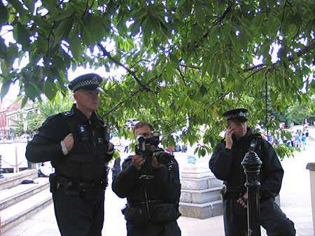 Police photographing people after the march