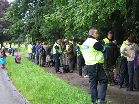 Click on image to see full-sized version Police search activists