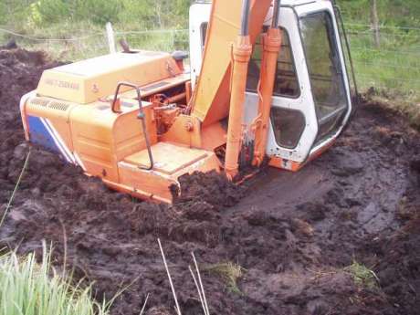As someone said at the planning hearings - you cannot build in a bog, here is a specially adapted wide tracked Shell hired digger sunk
