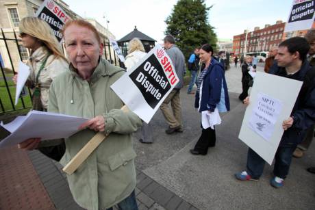 Breda with the support of her Siptu colleagues. She has been working at the Custom House for five years.