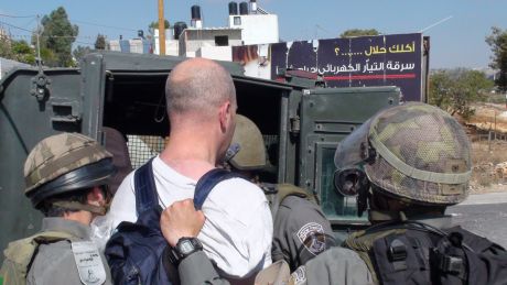 Israeli activist, Jonathan Shapiro under arrest