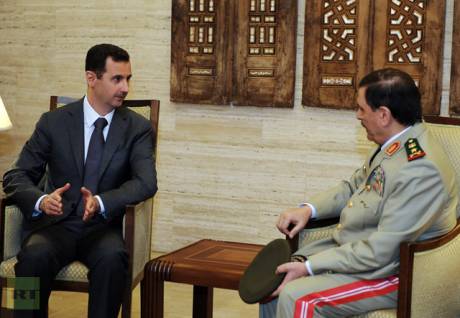 Syrian General Fahd al-Freij (R) meeting with Syrian President Bashar al-Assad in Damascus following his swearing in ceremony as the new defence minister (AFP Photo/SANA)