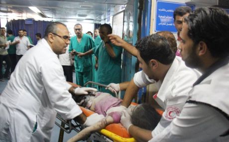 Child wounded in attack on Al-Rimal neighborhood, July 20th (image by Palestinian Ministry of Health)