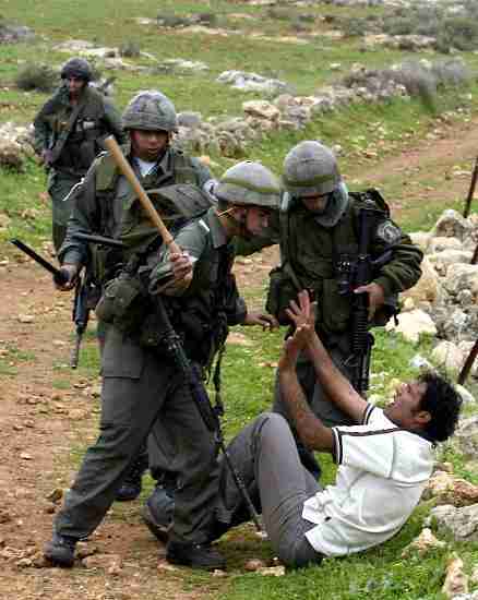 Basem being brutalised during a previous Bil'in demonstration 