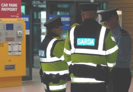 Inspector Kennedy, Sgt McMahon leading unduly large force of Gardai at Shannon
