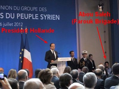 6th July 2012, War criminal Abou Saleh (Brigade Farouk) was special guest of President François Hollande (young man facing the camera). He had directed the Islamic Emirate of Baba Amr and ordered more than 150 people to have their throats cut in public
