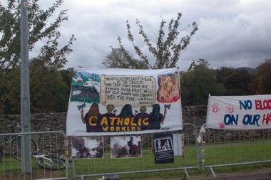 Colourful Catholic Workers banner displayed outside