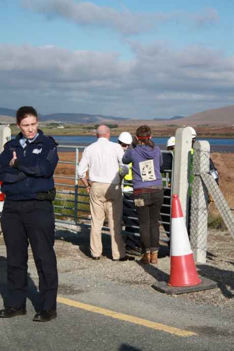 Plainclothes garda Noel Brett speaking with his mates (IRMS) after towing the vehicle