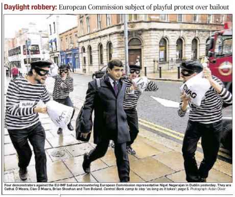DAYLIGHT ROBBERY: European Commission subject of playful protest over bailout