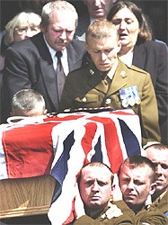 George and Rose Gentle follow their sons coffin from St James Church, Pollok. July 8th 2004