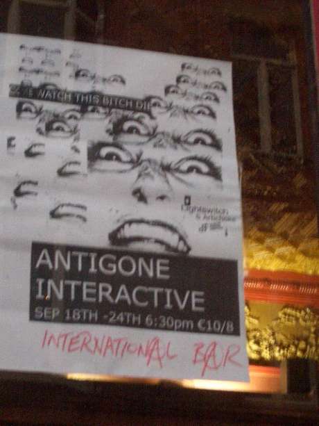 A Poster for the show on the window of the international bar.