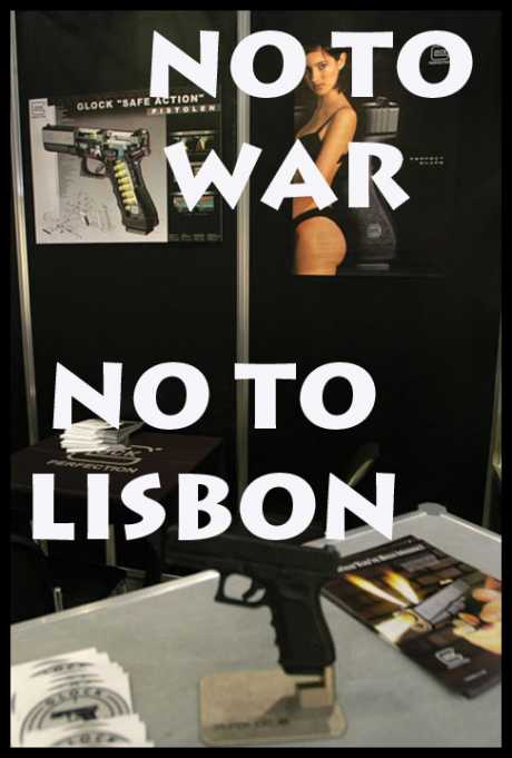 Happiness Is A Warm Gun - Photo  Paul Mattsson 2003 - Copyleft (free to use) for campaigners - Taken at an arms trade show in London.