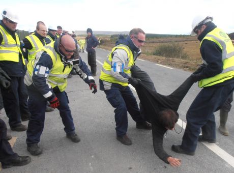 IRMS hauling campaigners across a public road